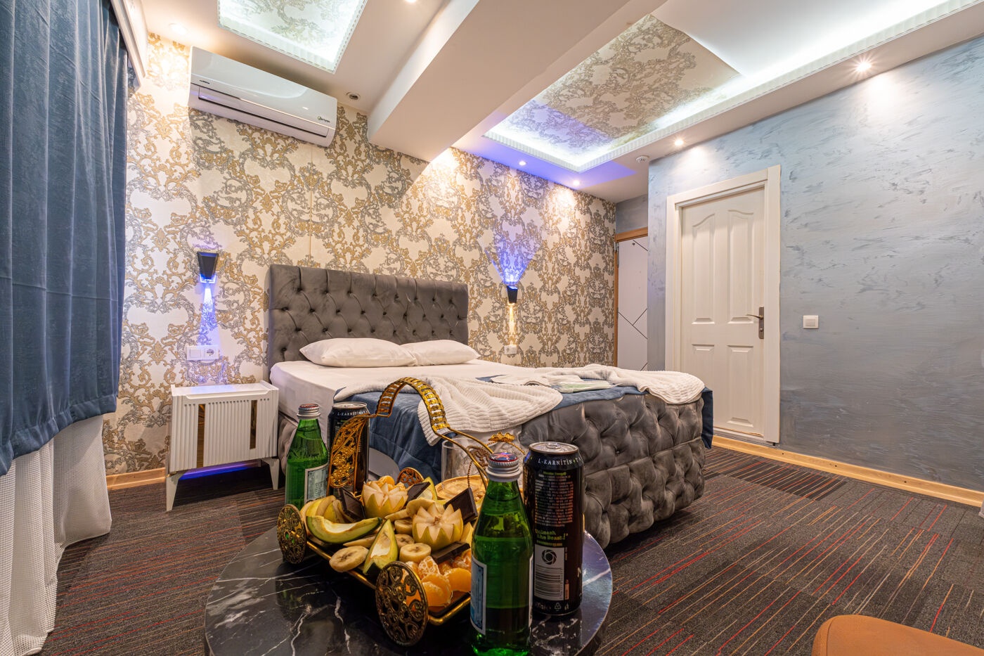 Outdoor swimming pool with sunbeds