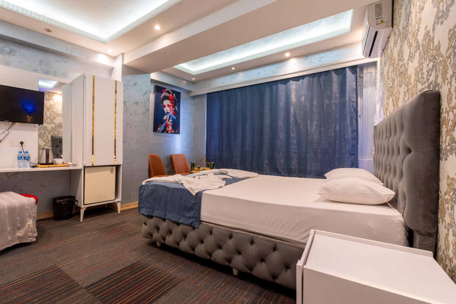 Experience ultimate relaxation at a sunlit tropical poolside resort featuring palm trees and blue skies.